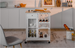 The kitchen islands full of things is in the room