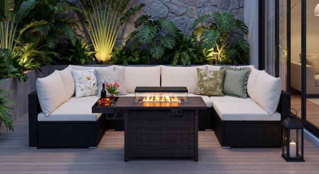 Weather-resistant wicker patio set with sofa and coffee table for backyard relaxation.